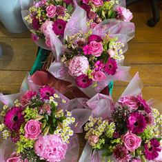 Seasonal florist choice handtied  in water bubble