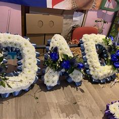 Dad letters based in white with ribbon edge